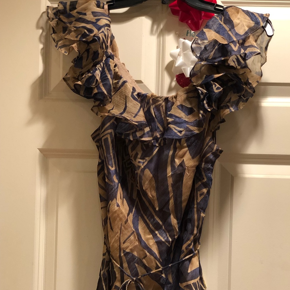 Ruffle neck sleeveless top